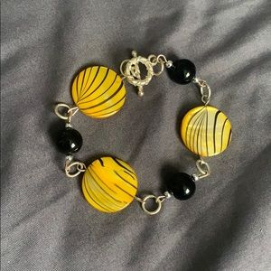 Yellow and black bracelet